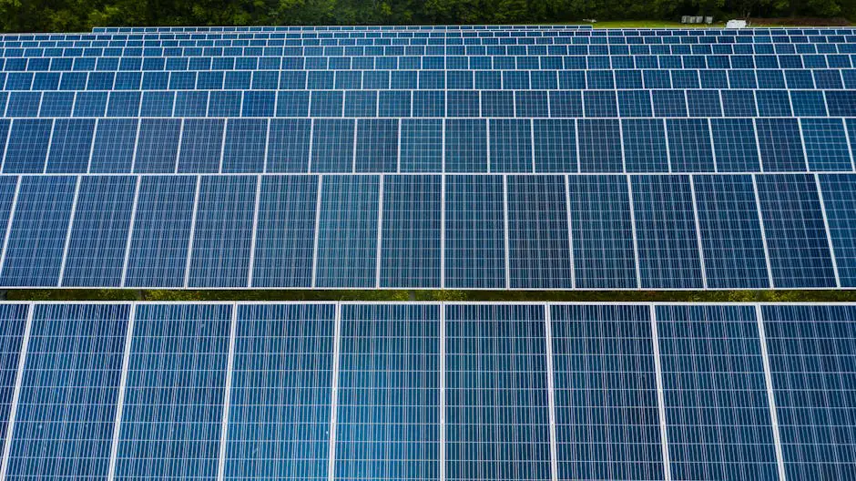 An aerial view of Apple's renewable energy facilities including solar arrays and wind farms