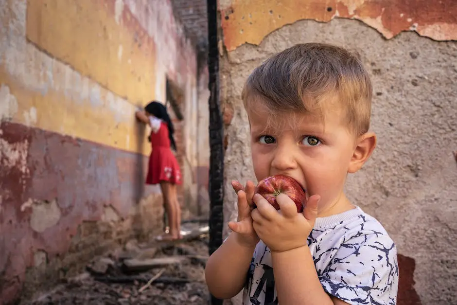 A picture of a turkey eating an apple. The apple is sliced into pieces and scattered on the ground. The turkey seems to be enjoying the treat and exploring the food with its beak.